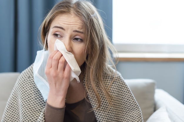 https://www.freepik.com/free-photo/woman-having-runny-nose-indoors_7329434.htm