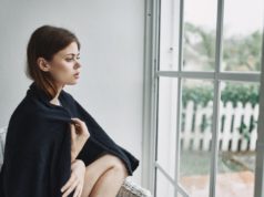 https://www.freepik.com/premium-photo/woman-home-near-window_9998481.htm