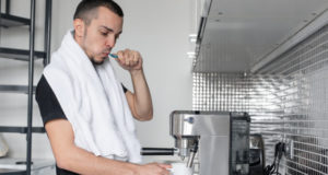 https://www.freepik.com/premium-photo/young-guy-is-going-work-morning-brushes-teeth-near-coffee-machine-while-waiting-cup-coffee_7254208.htm#page=6&query=home+coffee+maker&position=14