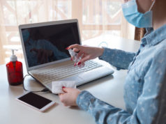 https://www.freepik.com/free-photo/young-woman-face-mask-disinfecting-gadgets-surfaces-her-workplace_7542446.htm