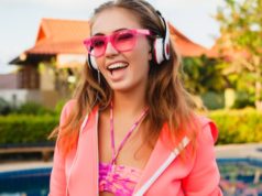 https://www.freepik.com/free-photo/attractive-woman-doing-sports-pool-colorful-pink-hoodie-wearing-sunglasses-listening-music-headphones-summer-vacation-play-tennis-sport-style_10523285.htm#page=4&query=headphones&position=20