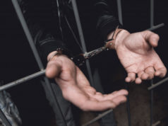 https://www.freepik.com/premium-photo/man-handcuffs-bars-police-station_4873356.htm#page=3&query=criminal&position=18