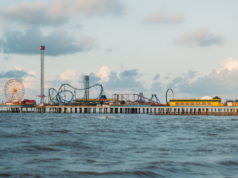 https://www.pexels.com/photo/white-and-brown-bridge-over-body-of-water-5042658/