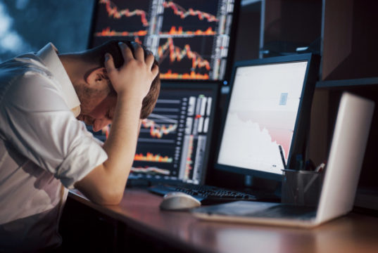 https://www.freepik.com/premium-photo/stressful-day-office-young-businessman-holding-hands-his-face-while-sitting-desk-creative-office-stock-exchange-trading-forex-finance-graphic_6180185.htm
