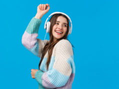 https://www.freepik.com/premium-photo/waist-up-portrait-carefree-happy-dancing-woman-headphones-smiling-raising-hands-up-free-upbeat-enjoying-favorite-songs-special-winter-holidays-playlisty-laughing-joyfully-blue_6863307.htm