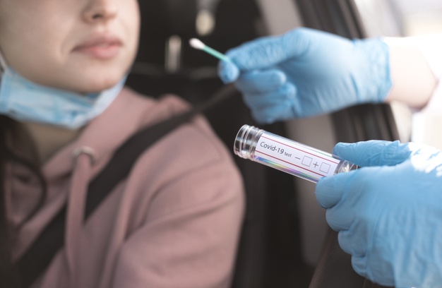 freepik/woman-car-being-tested-coronavirus_23-2148510546 https://www.freepik.com/free-photo/woman-car-being-tested-coronavirus_7764478.htm#page=1&query=covid%20testing&position=27