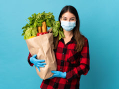 https://www.freepik.com/premium-photo/young-caucasian-with-vegetables-mask-isolated-blue-smiling-lot_9463823.htm#page=1&query=covid%20diet&position=16