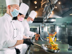 https://www.freepik.com/premium-photo/chefs-protective-masks-gloves-prepare-food-kitchen-restaurant-hotel_8372130.htm