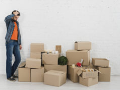 https://www.freepik.com/premium-photo/confused-young-man-looking-piles-cardboard-boxes-against-white-brick-wall_4273526.htm#page=4&query=moving&position=2