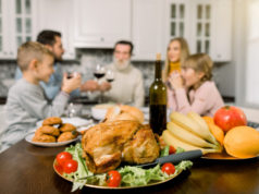https://www.freepik.com/premium-photo/family-sitting-table-celebrating-holiday-grandfather-mother-father-children-traditional-turket-fruits-wine-table-focus-turkey_9140553.htm
