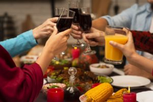 https://www.freepik.com/free-photo/family-toasting-glasses-thanksgiving-event_5682430.htm#page=1&query=thanksgiving%20wine&position=30
