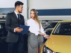 https://www.freepik.com/premium-photo/man-car-dealer-showing-woman-buyer-new-car-car-salon_10499157.htm
