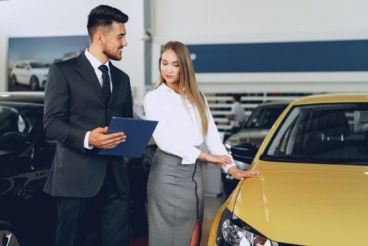 https://www.freepik.com/premium-photo/man-car-dealer-showing-woman-buyer-new-car-car-salon_10499157.htm