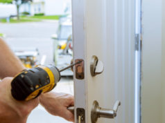 https://www.freepik.com/premium-photo/man-repairing-doorknob-closeup-worker-s-hands-installing-new-door-locker_4036284.htm#page=2&query=locksmith&position=6