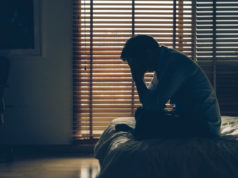 https://www.freepik.com/premium-photo/sad-businessman-sitting-head-hands-bed-dark-bedroom_2155751.htm#page=1&query=depression&position=14