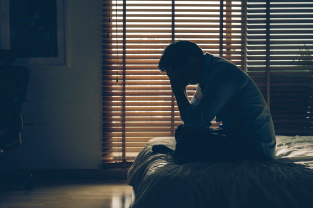 https://www.freepik.com/premium-photo/sad-businessman-sitting-head-hands-bed-dark-bedroom_2155751.htm#page=1&query=depression&position=14