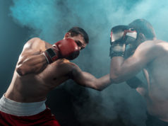 https://www.freepik.com/free-photo/two-professional-boxer-boxing-black-smoky-space_9368309.htm#page=3&query=boxing&position=43