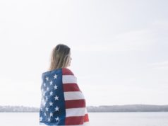 https://www.freepik.com/free-photo/woman-standing-completely-wrapped-american-flag-looking-sea_4577693.htm#page=2&query=wrapped+american+flag&position=18