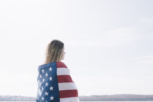 https://www.freepik.com/free-photo/woman-standing-completely-wrapped-american-flag-looking-sea_4577693.htm#page=2&query=wrapped+american+flag&position=18