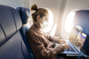 https://www.freepik.com/premium-photo/young-woman-wearing-face-mask-is-traveling-airplane-new-normal-travel-after-covid-19-pandemic-concept_9102465.htm