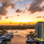aerial-view-fort-lauderdale-waterway-canals-residential-homes-skyline-sunset_130111-962