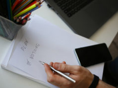 https://www.freepik.com/premium-photo/male-hand-hold-silver-pen-composing-list_6553855.htm#page=1&query=financial%20procrastination&position=3