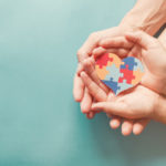 adult-chiild-hands-holding-jigsaw-puzzle-heart-shape-autism-awareness-autism-spectrum-family-support-concept-world-autism-awareness-day_49149-1213