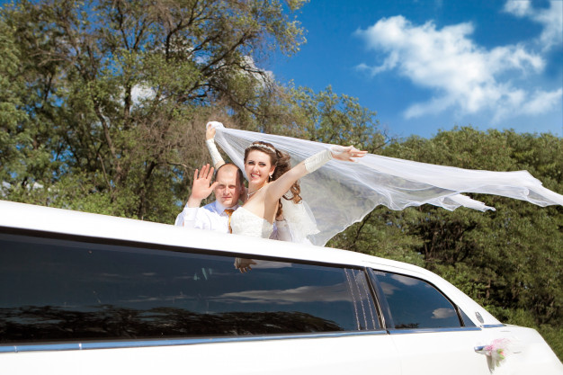 bride-groom-standing-limo-waving_104263-562 https://www.freepik.com/premium-photo/bride-groom-standing-limo-waving_5266926.htm#page=3&query=limousine&position=9