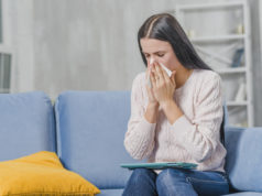 https://www.freepik.com/premium-photo/close-up-woman-sitting-blue-sofa-holding-digital-tablet-her-lap-suffering-from-cough_3590109.htm#page=1&query=flu&position=4