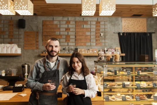 https://www.freepik.com/free-photo/couple-aprons-posing-with-cups-coffee_6154176.htm#page=1&query=small%20business&position=37