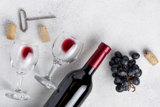 https://www.freepik.com/free-photo/flat-lay-red-wine-bottle-table_6595516.htm
