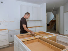 https://www.freepik.com/premium-photo/man-interior-designer-using-tape-measure-domestic-kitchen-counter_9032797.htm