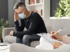 https://www.freepik.com/premium-photo/mid-shot-worried-man-with-mask-therapy-office-near-counselor_11241725.htm