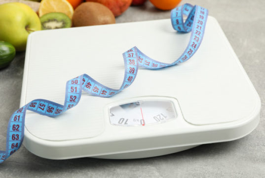https://www.freepik.com/premium-photo/scales-measuring-tape-vegetarian-food-gray-floor_8996311.htm