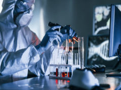 https://www.freepik.com/premium-photo/scientist-white-protective-uniform-works-with-coronavirus-blood-tubes-laboratory_7323296.htm#page=2&query=covid+lab&position=13