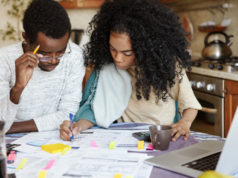 https://www.freepik.com/free-photo/young-confident-african-housewife-with-afro-hairstyle-helping-her-husband-manage-domestic-finances-calculating-making-notes-with-pen-both-sitting-kitchen-table-with-laptop-papers_9535267.htm#page=1&query=bankrupt%20couple&position=21