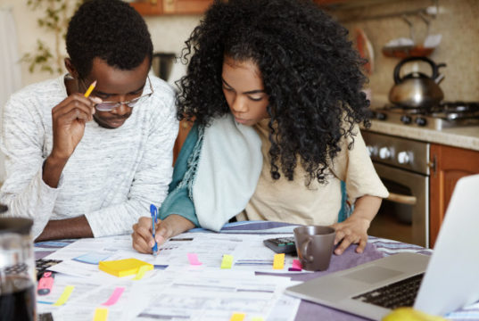 https://www.freepik.com/free-photo/young-confident-african-housewife-with-afro-hairstyle-helping-her-husband-manage-domestic-finances-calculating-making-notes-with-pen-both-sitting-kitchen-table-with-laptop-papers_9535267.htm#page=1&query=bankrupt%20couple&position=21