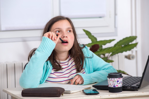 young-teenager-girl-is-doing-her-homework_112793-8661 https://www.freepik.com/premium-photo/young-teenager-girl-is-doing-her-homework_7514269.htm#page=1&query=kids%20do%20schoolwork&position=14