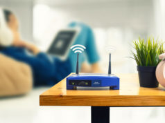https://www.freepik.com/premium-photo/closeup-wireless-router-man-using-smartphone-living-room-home-office_4151722.htm#page=1&query=wifi+router&position=15