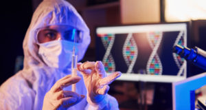 https://www.freepik.com/premium-photo/nurse-mask-white-uniform-holding-syringe-sitting-neon-lighted-laboratory-with-computer-medical-equipment-searching-coronavirus-vaccine_7323342.htm