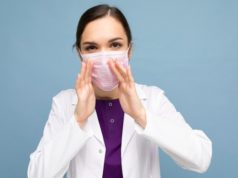 https://www.freepik.com/premium-photo/portrait-attractive-young-female-doctor-white-coat-medical-mask-standing-isolated_12789839.htm