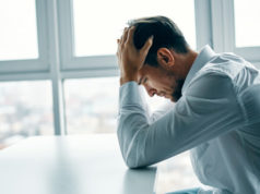 https://www.freepik.com/premium-photo/young-man-sitting-table-depressed-against-window_7064414.htm#page=1&query=depression&position=40