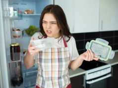 https://www.freepik.com/premium-photo/young-woman-kitchen-stand-front-opened-fridge-with-food-tray-with-bad-smell-disgution_7603972.htm