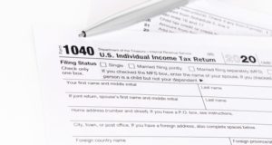 https://www.freepik.com/premium-photo/1040-tax-form-being-filled-out_13047127.htm