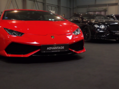https://www.storyblocks.com/video/stock/front-view-of-a-red-lamborghini-at-a-car-exhibition-with-black-car-next-to-it-people-walk-in-the-background-sx-xiup1ik4sccsq6