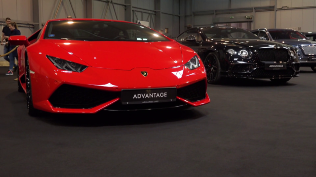 https://www.storyblocks.com/video/stock/front-view-of-a-red-lamborghini-at-a-car-exhibition-with-black-car-next-to-it-people-walk-in-the-background-sx-xiup1ik4sccsq6