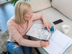 https://www.freepik.com/premium-photo/beautiful-young-albino-woman-sitting-with-calculator-bills-doing-paperwork-hand-woman-doing-finances-calculate-desk-about-cost-home-office-concept-work-from-home_8260784.htm#page=1&query=millennial%20debt&position=5