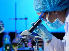 https://www.freepik.com/free-photo/examining-sample-with-microscope_5634023.htm#page=1&query=lab&position=0
