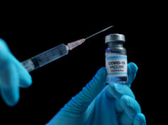 https://www.freepik.com/premium-photo/hand-blue-glove-holding-vaccine-syringe-injection-prevention-immunization-treatment-from-corona-virus-infection_8657553.htm#page=2&query=covid+vaccines&position=19