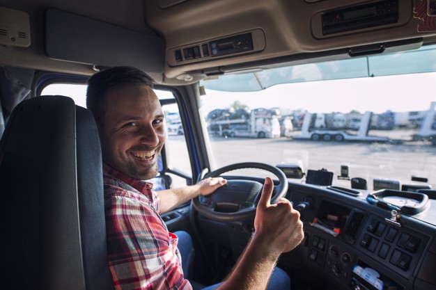 https://www.freepik.com/free-photo/portrait-truck-driver-sitting-his-truck-holding-thumbs-up_11451014.htm#page=1&query=truck%20driver&position=1